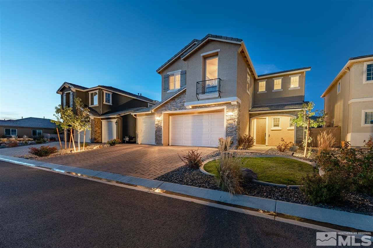 2935 Bonfire Lane Reno, NV 89521 - Photo 1 of 39 a front view of a house with a yard