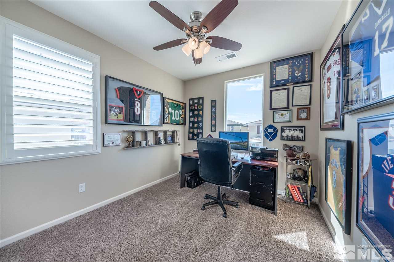 2935 Bonfire Lane Reno, NV 89521 - Photo 24 of 39 a workspace with furniture and a window