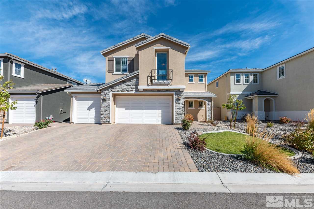 2935 Bonfire Lane Reno, NV 89521 - Photo 4 of 39 a front view of a house with swimming pool