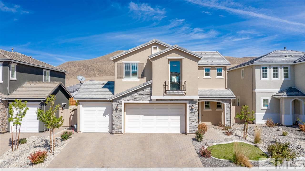 2935 Bonfire Lane Reno, NV 89521 - Photo 5 of 39 a front view of a house with a yard
