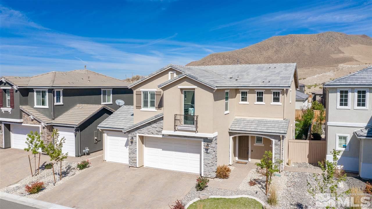 2935 Bonfire Lane Reno, NV 89521 - Photo 6 of 39 a front view of a house with a yard