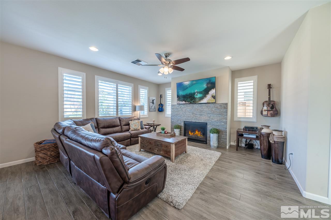 2935 Bonfire Lane Reno, NV 89521 - Photo 10 of 39 a living room with furniture and a fireplace