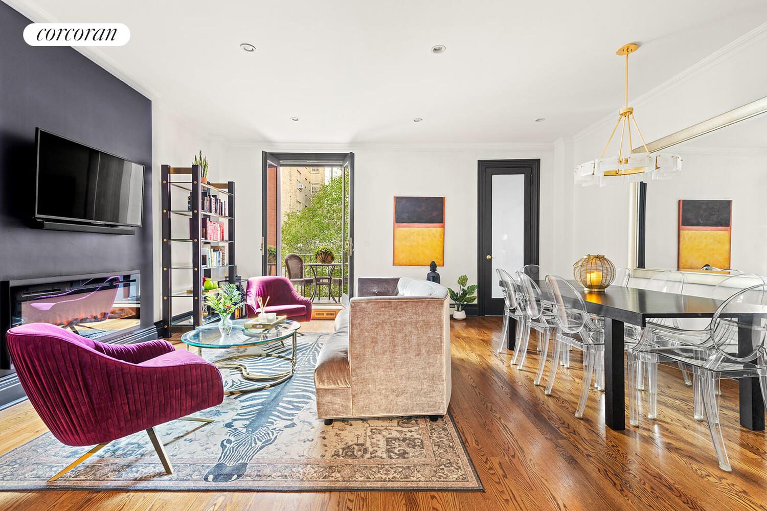 124 West 87th Street Manhattan, NY 10024 - Photo 17 of 37 a living room with fireplace furniture and a flat screen tv