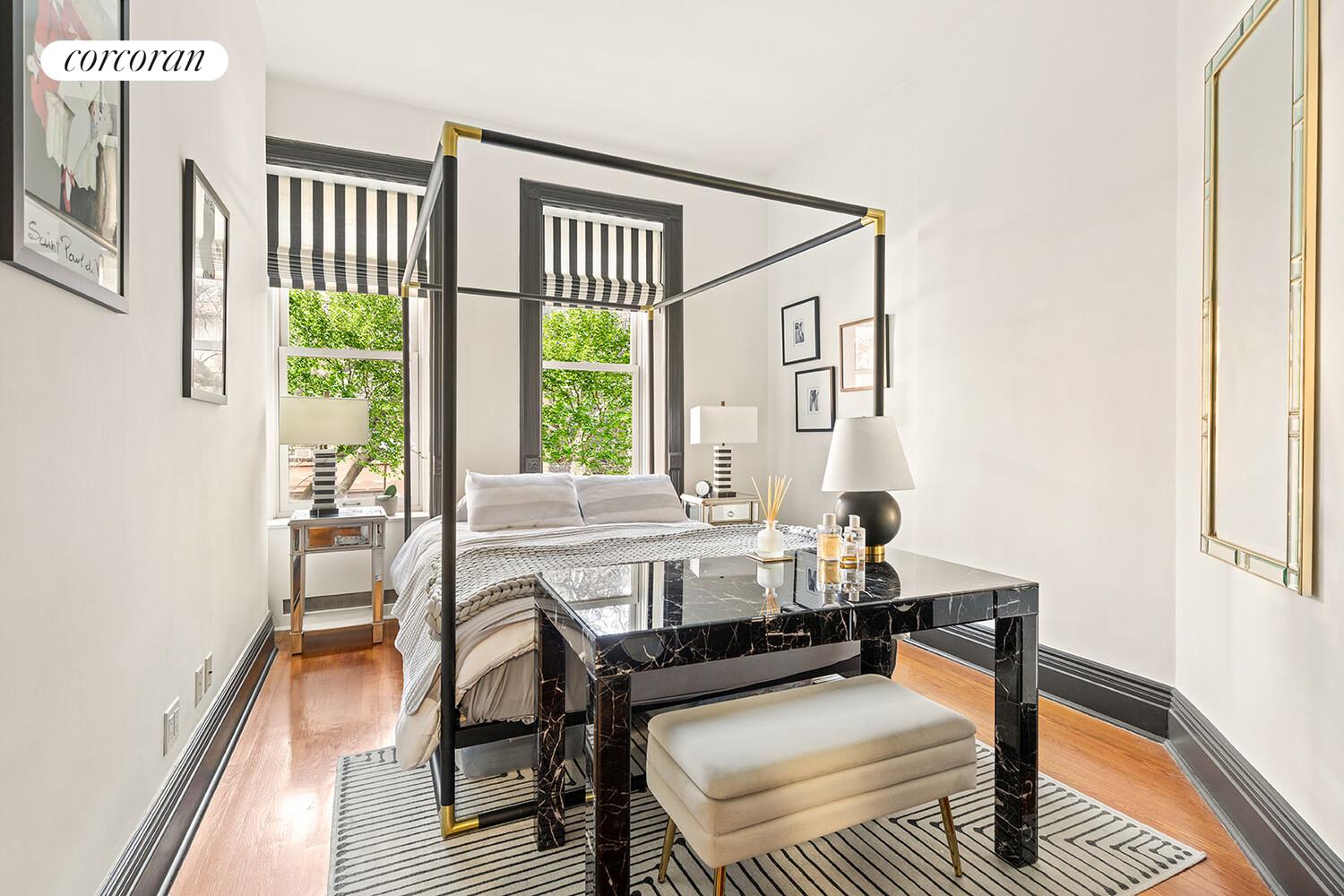 124 West 87th Street Manhattan, NY 10024 - Photo 22 of 37 a living room with furniture and a window