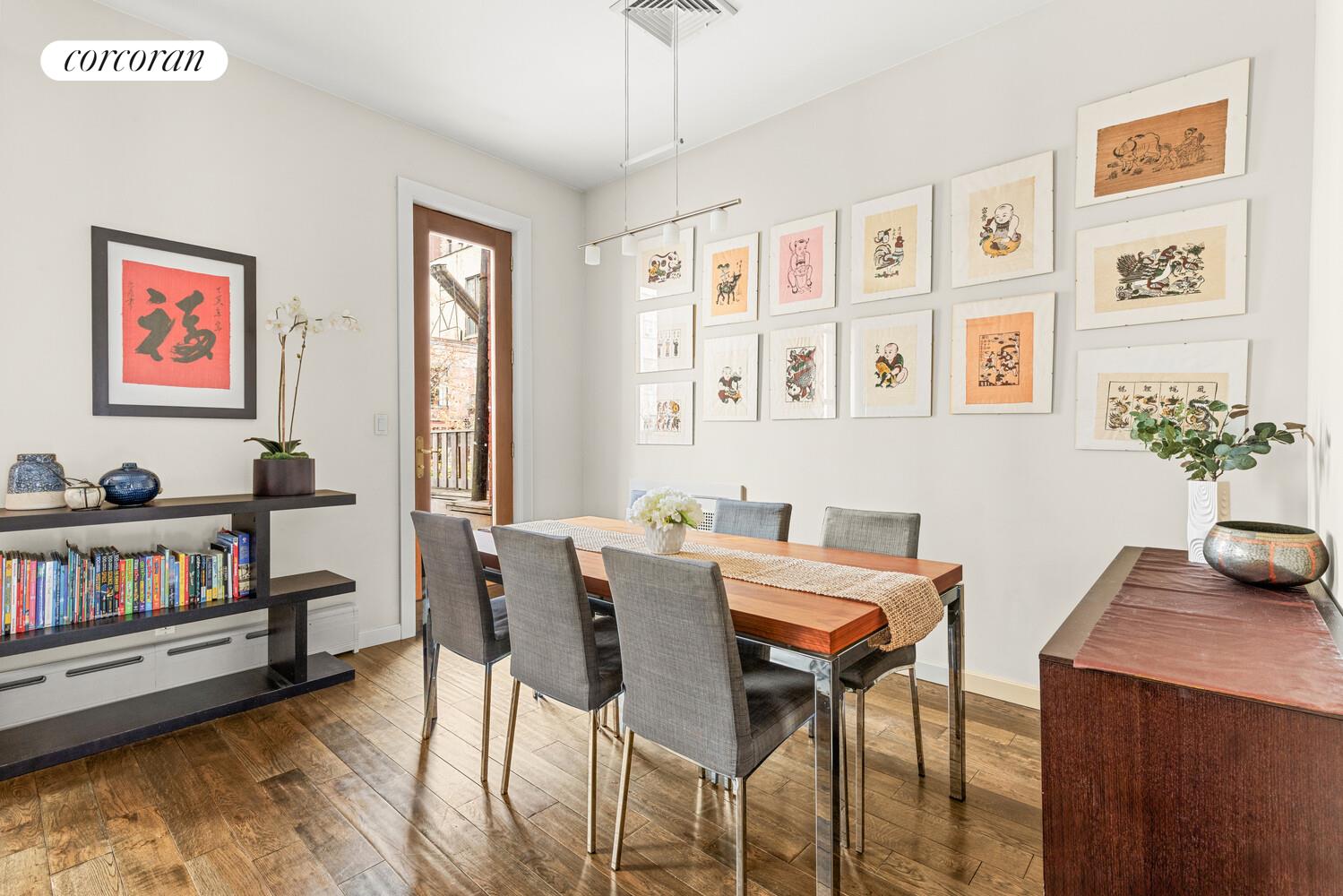 124 West 87th Street Manhattan, NY 10024 - Photo 28 of 37 a view of a livingroom with furniture window and wooden floor