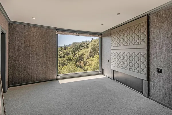 a view of livingroom with furniture and floor to ceiling window