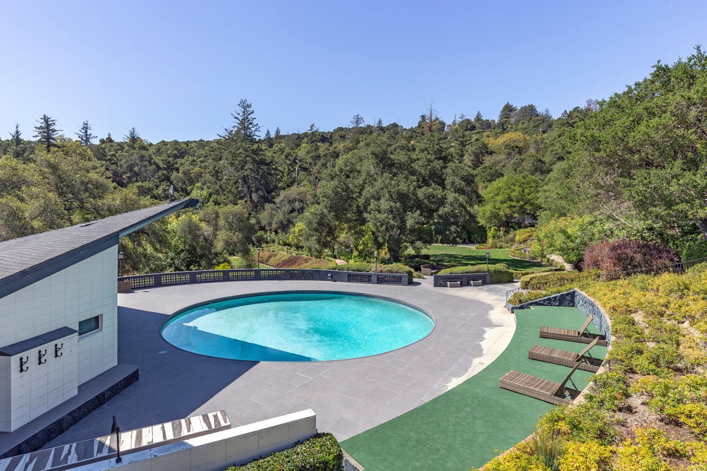 835 La Honda Road Woodside, CA 94062 - Photo 24 of 26 a view of a swimming pool with a yard and outdoor seating