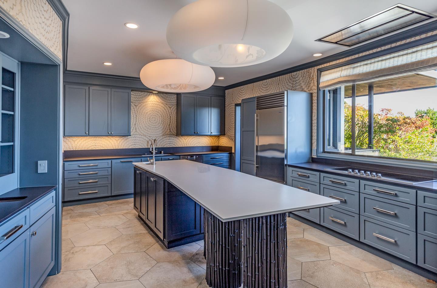835 La Honda Road Woodside, CA 94062 - Photo 10 of 26 a kitchen with stainless steel appliances granite countertop a sink and a stove