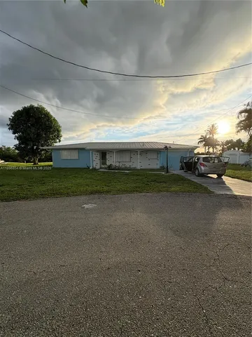 a view of outdoor space and yard