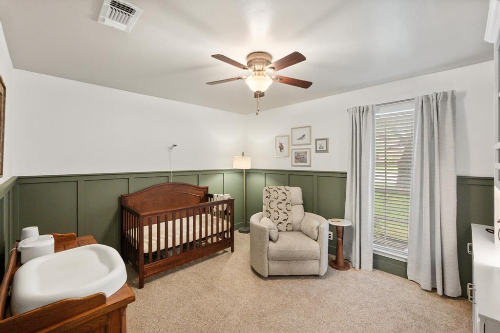 1520 Timbercreek Road Benbrook, TX 76126 - Photo 24 of 30 a bedroom with furniture and a window