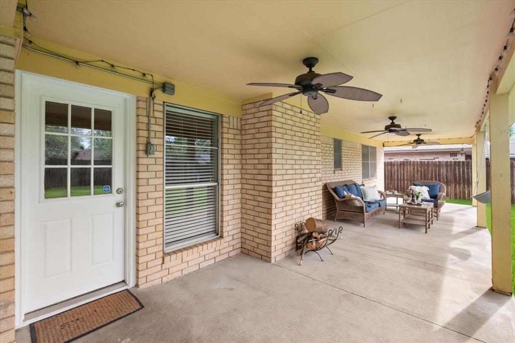 1520 Timbercreek Road Benbrook, TX 76126 - Photo 27 of 30 a view of a livingroom with furniture and a window