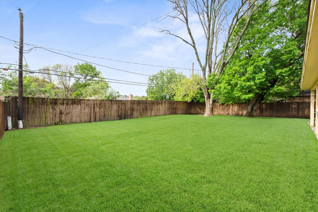 1520 Timbercreek Road Benbrook, TX 76126 - Photo 29 of 30 a view of yard with trees in the background
