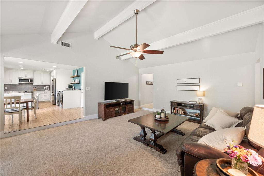 1520 Timbercreek Road Benbrook, TX 76126 - Photo 9 of 30 a living room with furniture and a flat screen tv
