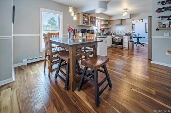 a view of a dining room with furniture