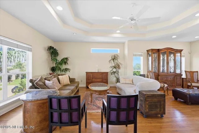 a bath tub sitting next to a window