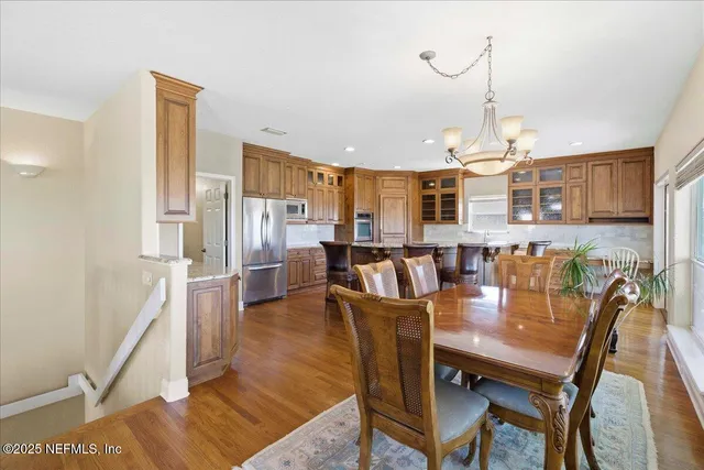 a view of a house with wooden deck