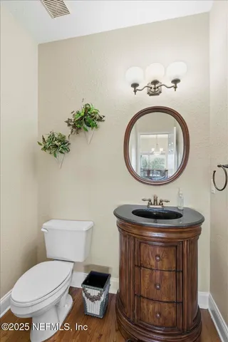 an aerial view of multiple houses with yard