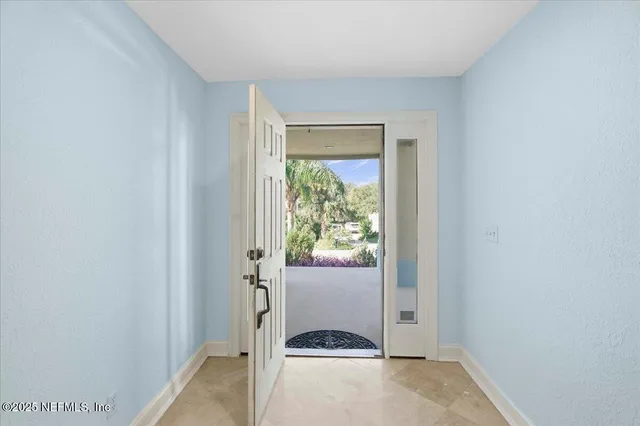 a bathroom with a sink a toilet a mirror and shower