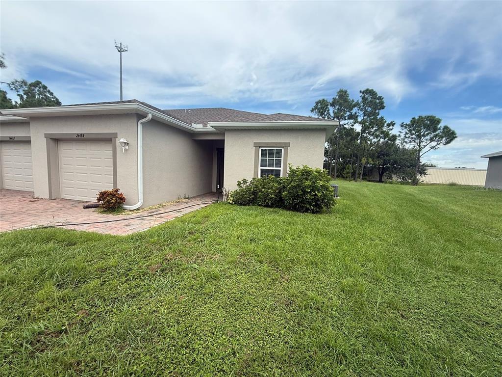 24484 Zephyr Court Punta Gorda, FL 33983 - Photo 1 of 22 a house view with a garden space