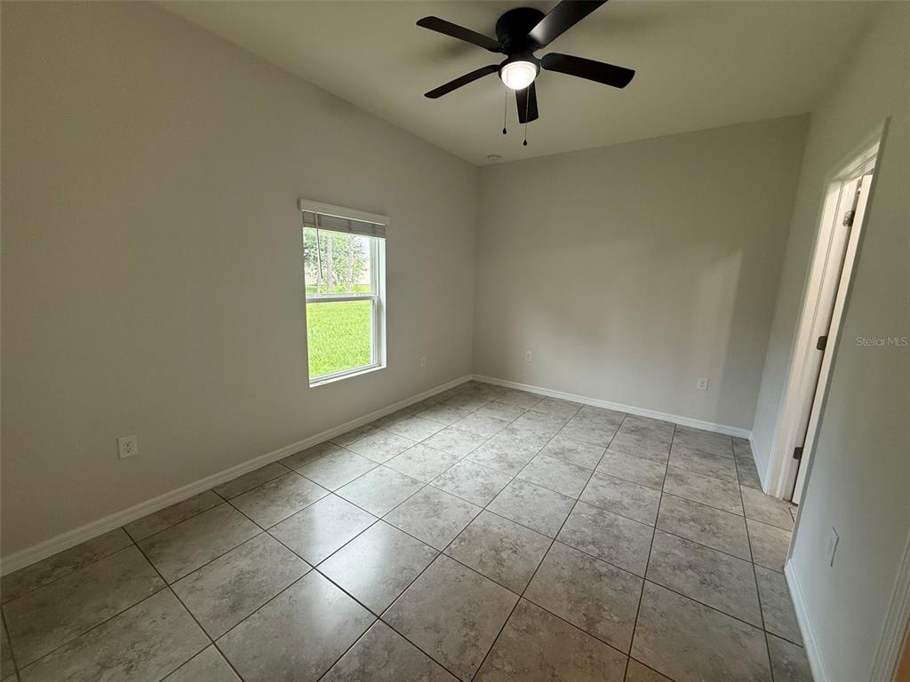 24484 Zephyr Court Punta Gorda, FL 33983 - Photo 11 of 22 a view of an empty room with a window