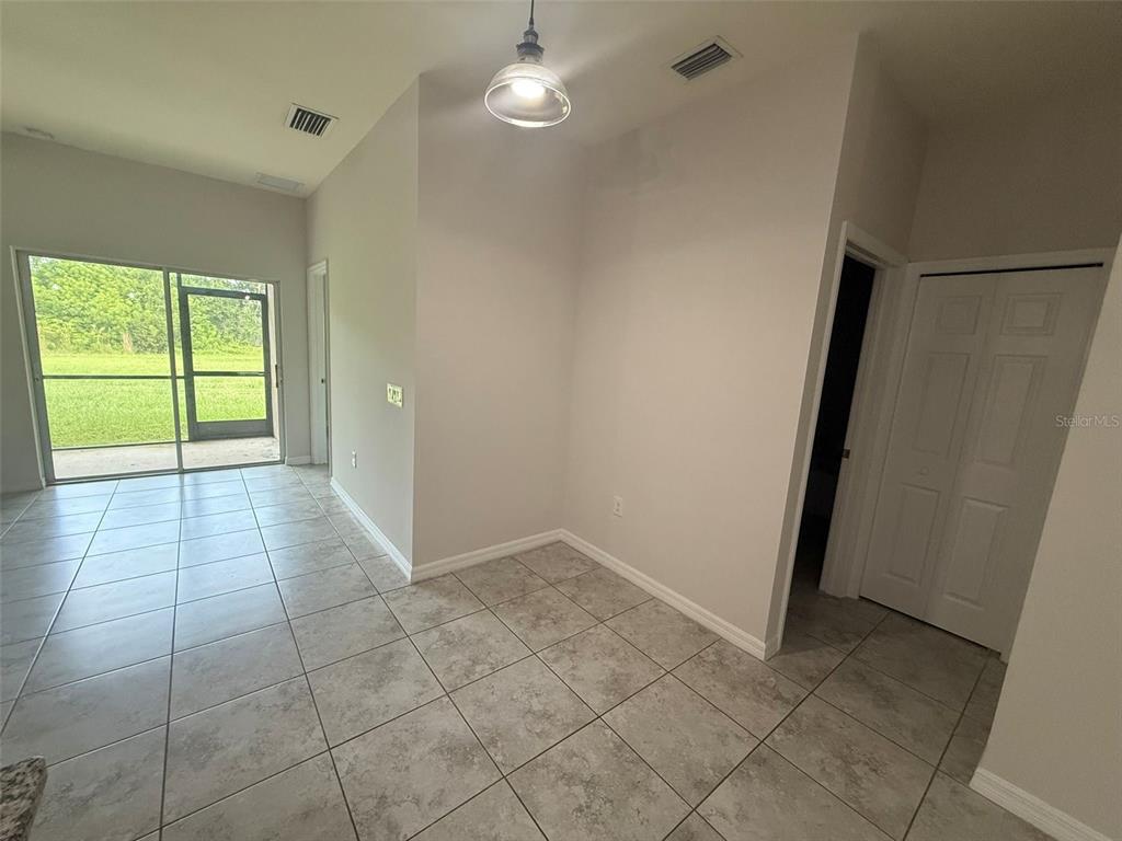 24484 Zephyr Court Punta Gorda, FL 33983 - Photo 8 of 22 a view of an empty room with a window