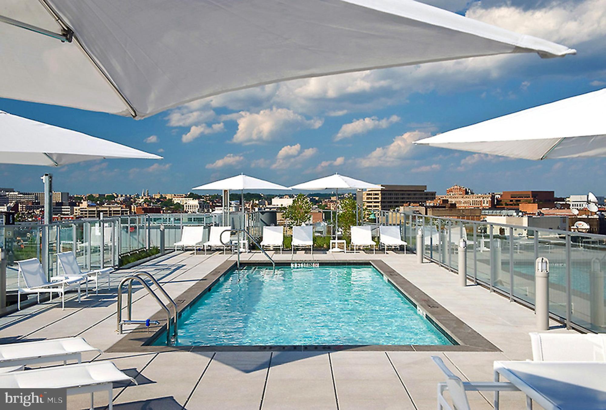 1177 22nd Street Northwest, Unit 7B Washington, DC 20037 - Photo 23 of 26 Rooftop pool and sun deck