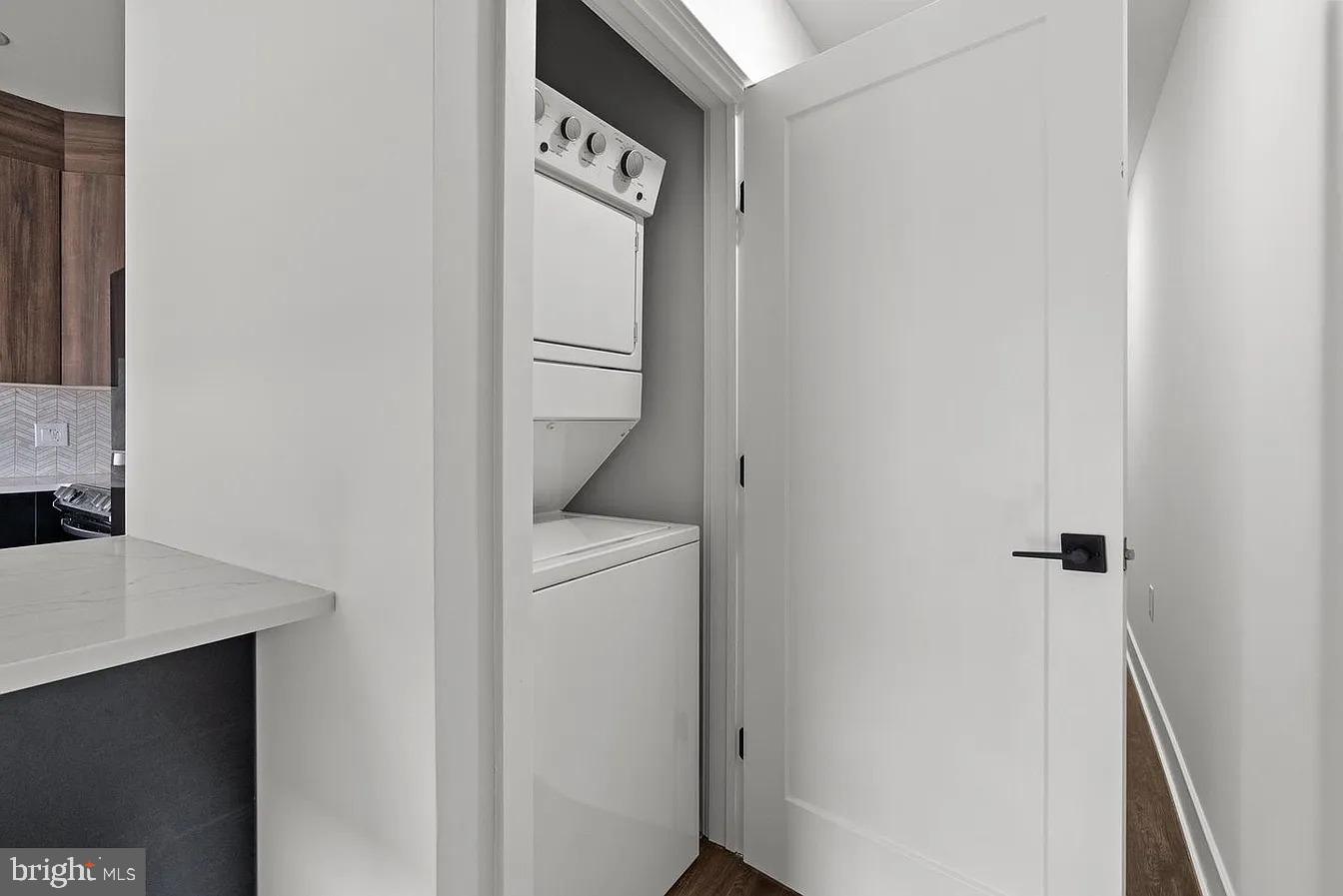 2146 North Front Street, Unit 3 Philadelphia, PA 19122 - Photo 14 of 23 a utility room with dryer and washer
