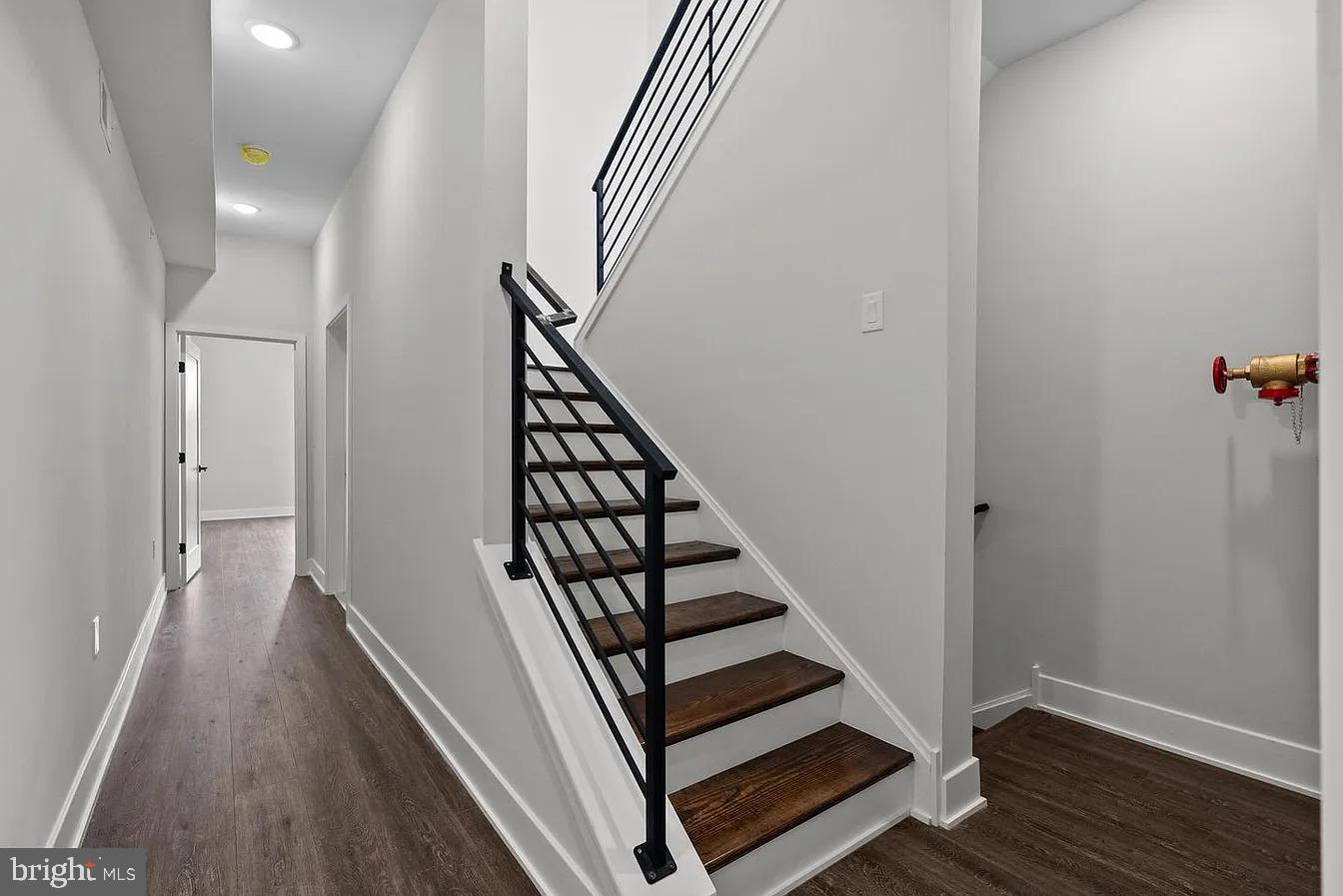 2146 North Front Street, Unit 3 Philadelphia, PA 19122 - Photo 17 of 23 a view of a hallway with wooden floor and entryway