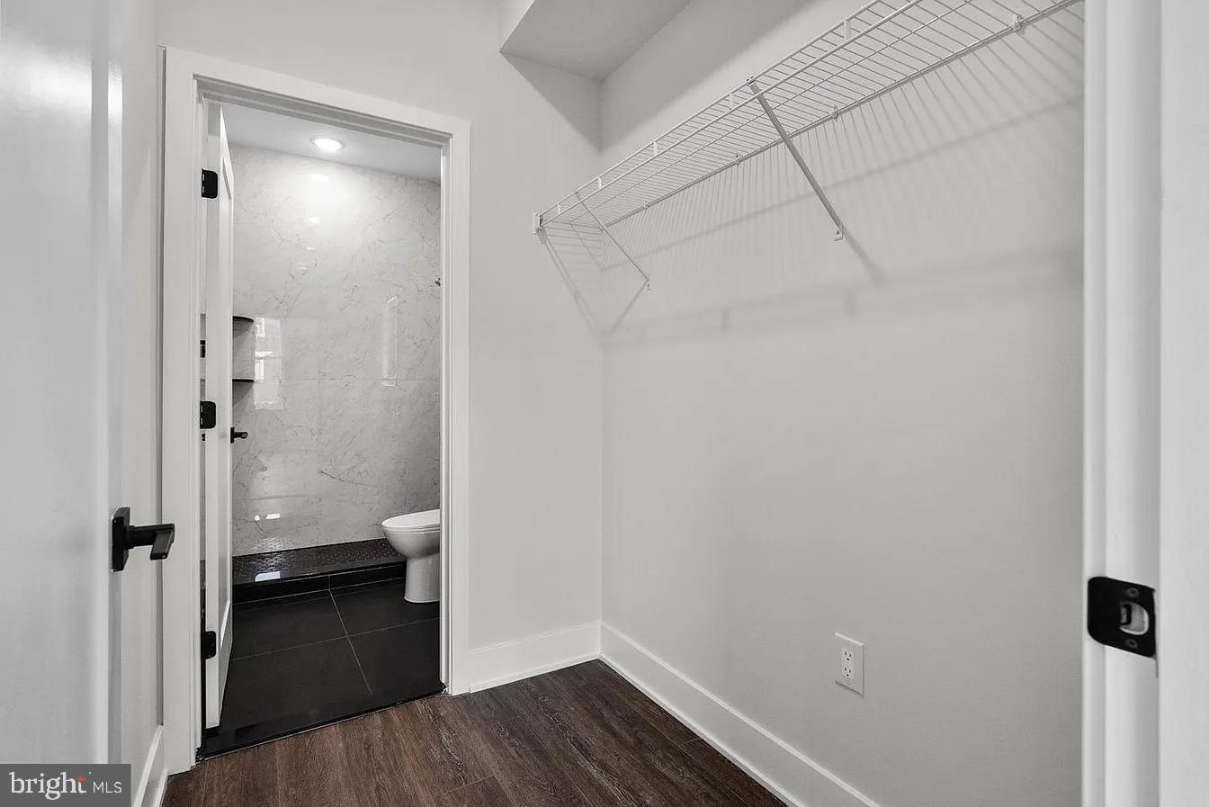 2146 North Front Street, Unit 3 Philadelphia, PA 19122 - Photo 6 of 23 a view of a bathroom from a hallway