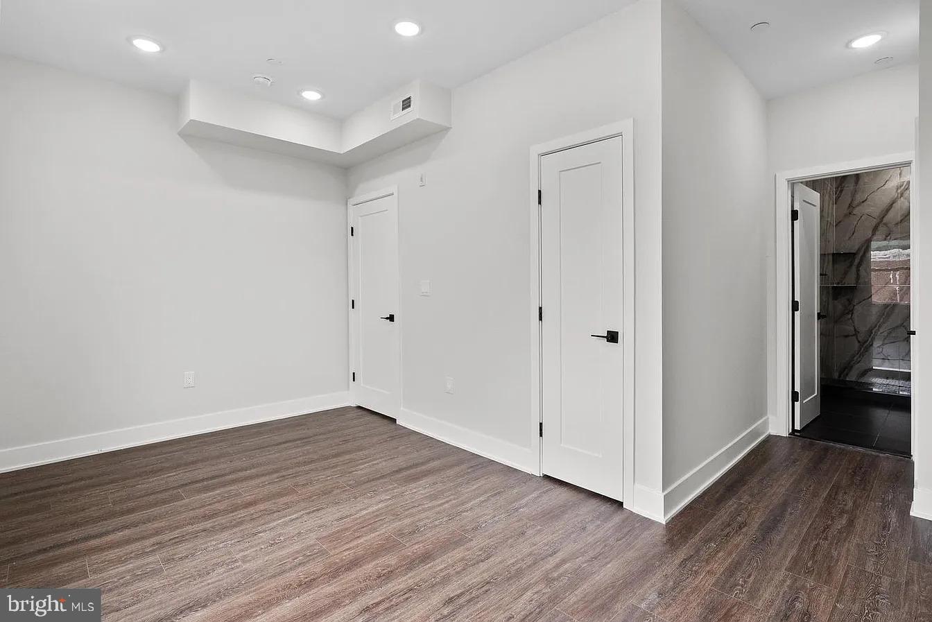 2146 North Front Street, Unit 3 Philadelphia, PA 19122 - Photo 10 of 23 a view of an empty room with wooden floor
