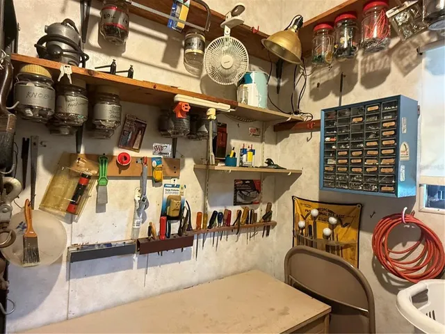 a kitchen with stainless steel appliances white cabinets and a sink