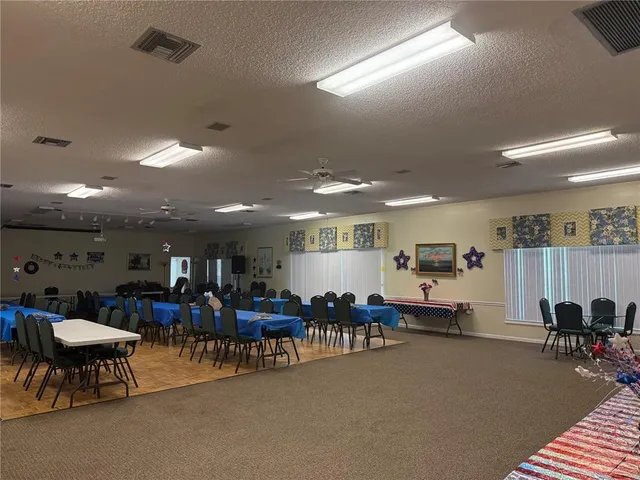 a outdoor space with lots of furniture and entertaining space