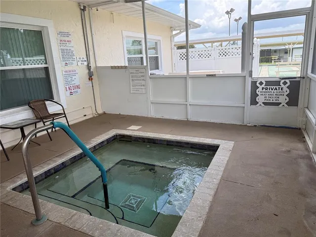 a front view of house with yard and outdoor seating