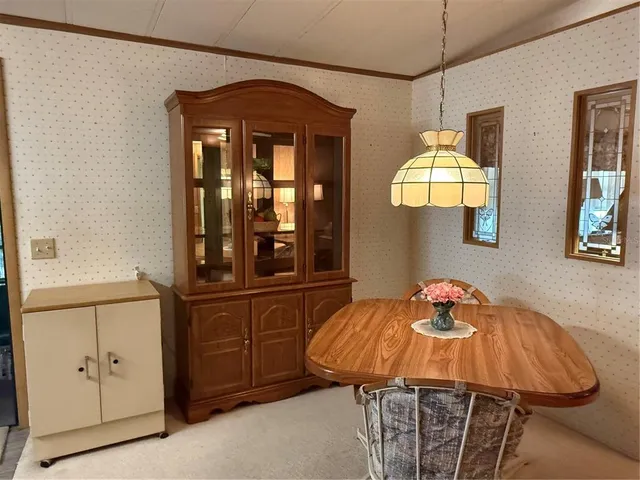 a view of a dining room with furniture