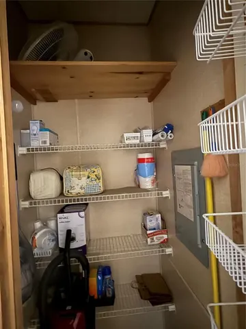 a white stove top oven sitting inside of a kitchen