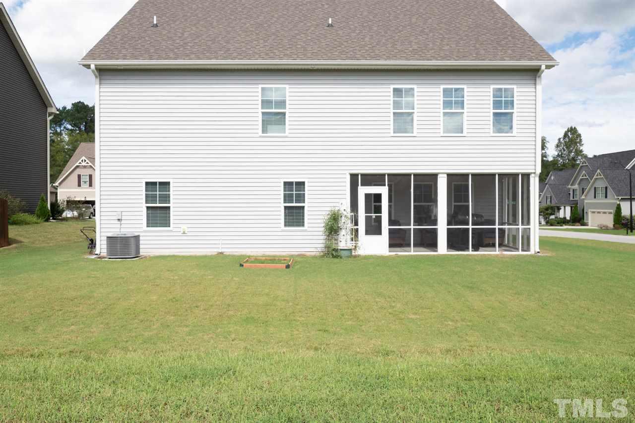 4436 Glengrove Road Raleigh, NC 27616 - Photo 25 of 25 a front view of a house with a garden