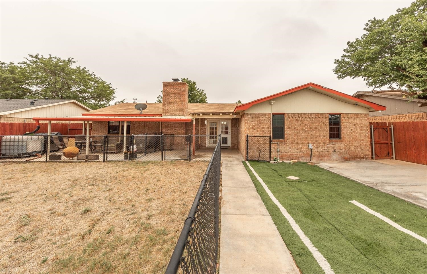 5722 2nd Place Lubbock, TX 79416 - Photo 17 of 21 a view of a house with a patio