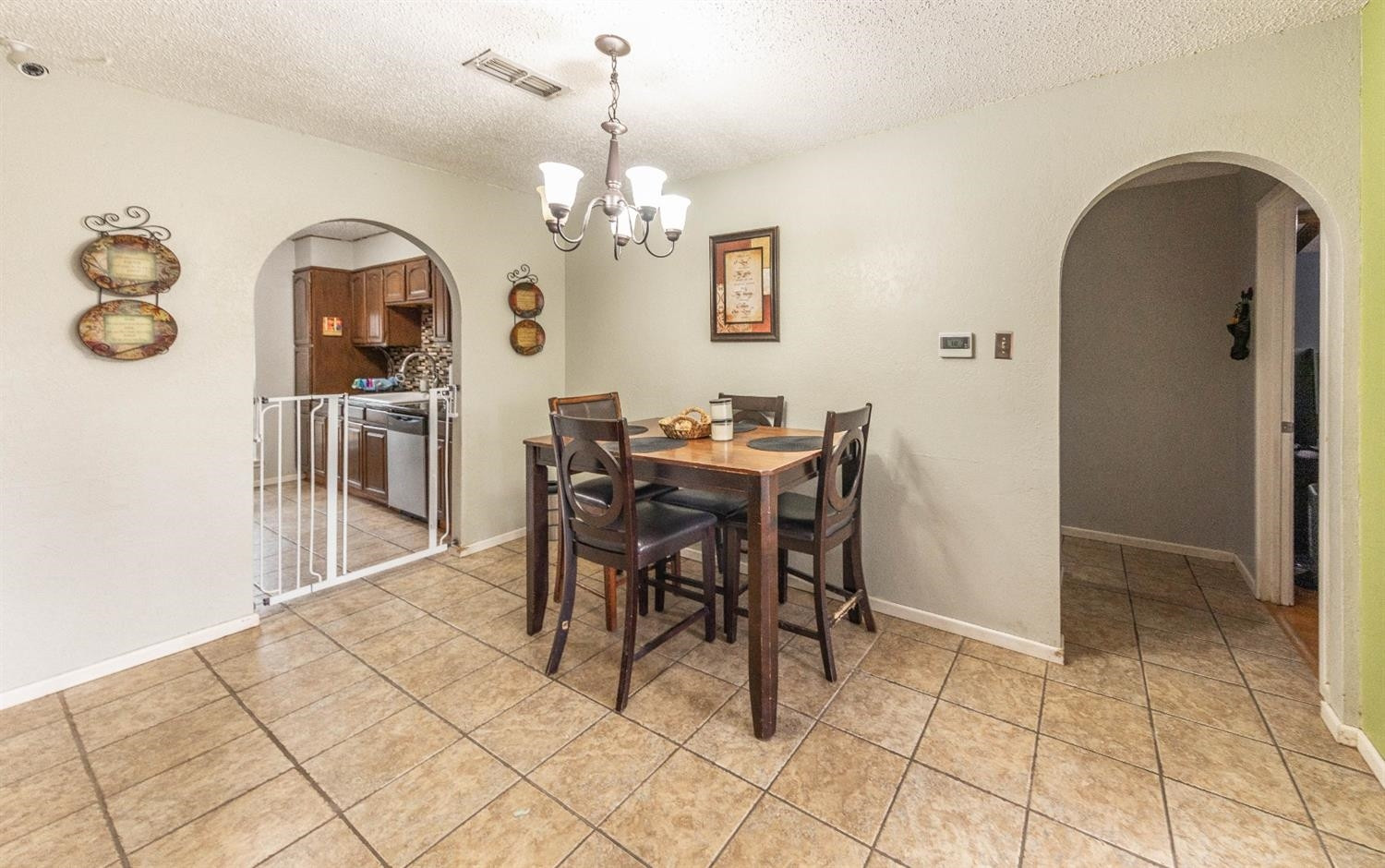 5722 2nd Place Lubbock, TX 79416 - Photo 7 of 21 a view of a dining room with furniture