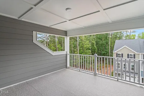 a view of a house with porch and wooden floor