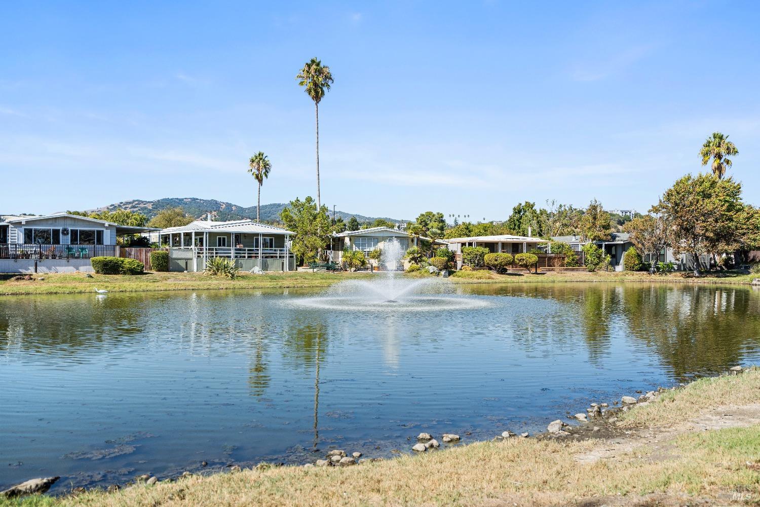 a view of a lake with a house