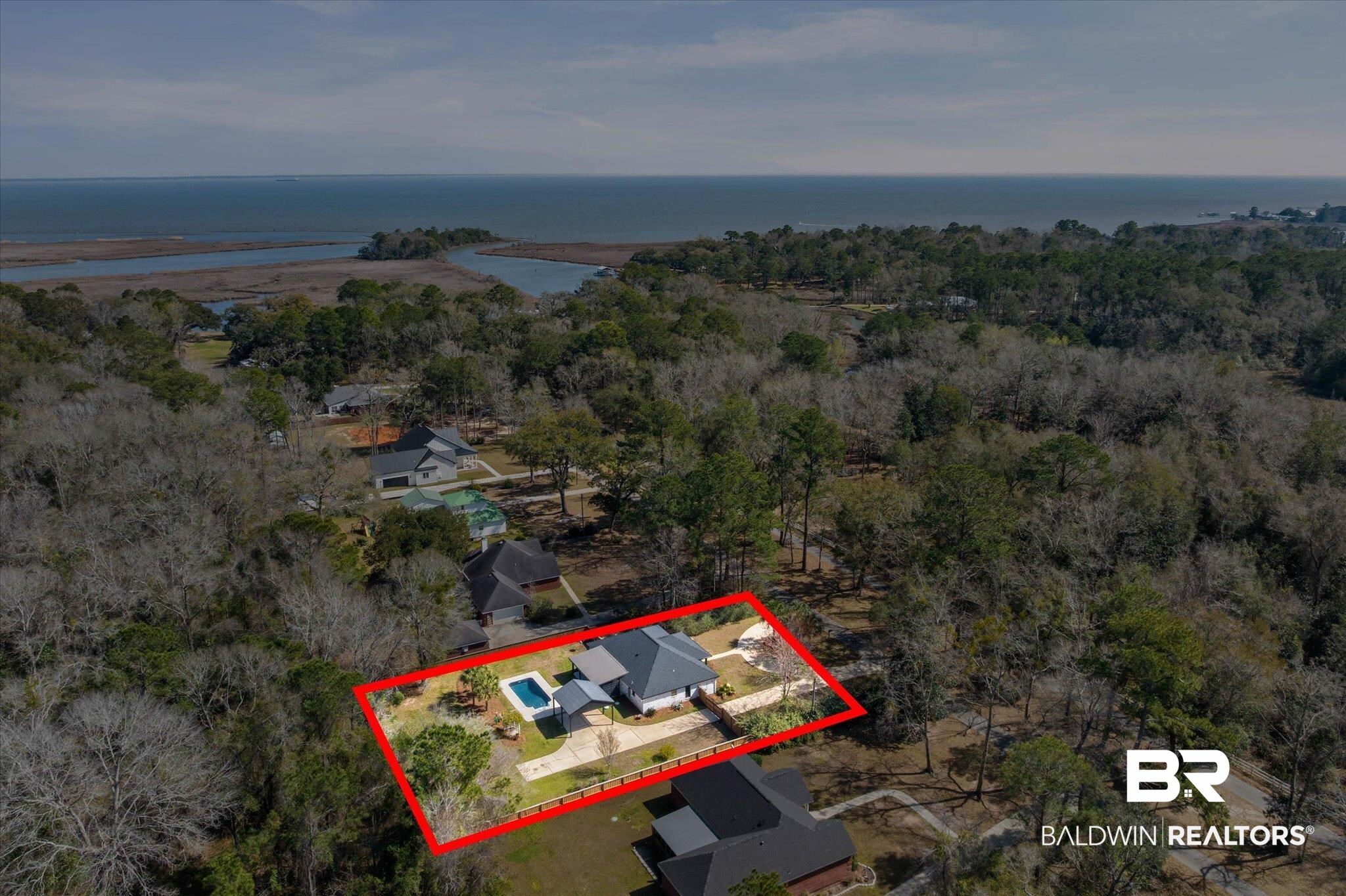 3216 Bay Booster Club Road Theodore, AL 36582 - Photo 42 of 46 Aerial view of property and surrounding area with property parcel outlined and a nearby body of water