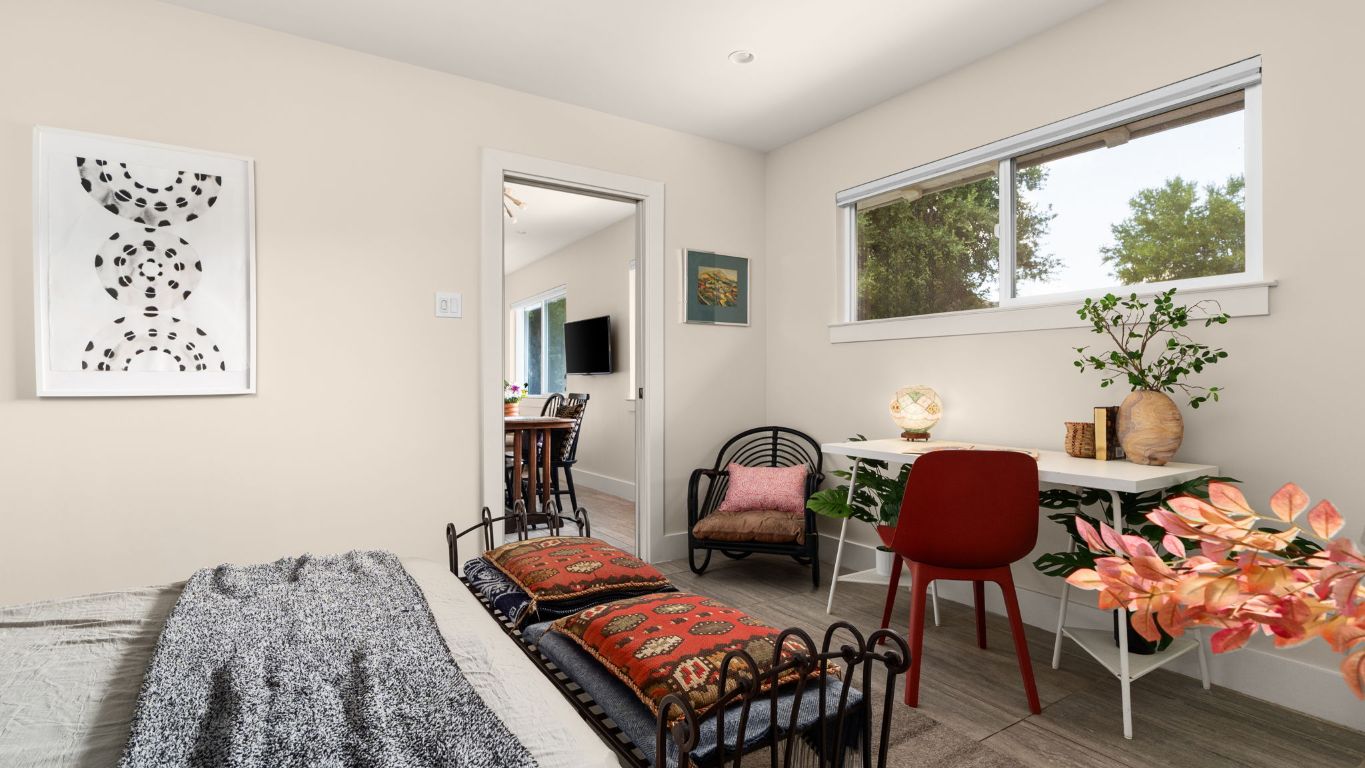 1208 Enfield Road, Unit 204 Austin, TX 78703 - Photo 14 of 21 a living room with furniture and a potted plant