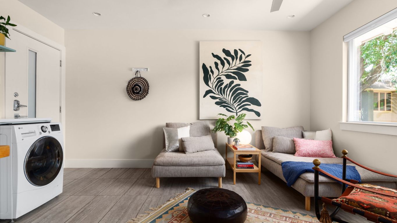 1208 Enfield Road, Unit 204 Austin, TX 78703 - Photo 16 of 21 a living room with furniture and a window