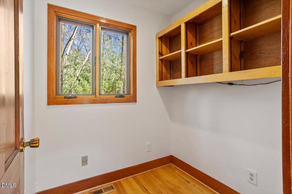 4805 Rembert Drive Raleigh, NC 27612 - Photo 7 of 45 a view of empty room with a window