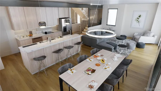 a bedroom with furniture and a wooden floor