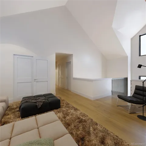 a bedroom with a bed and a couch