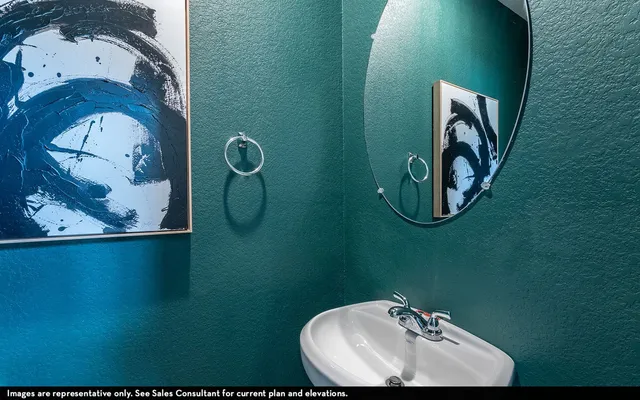 a bathroom with a sink and mirror