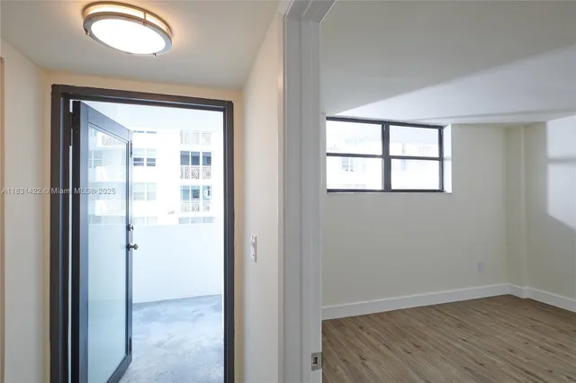 an empty room with window