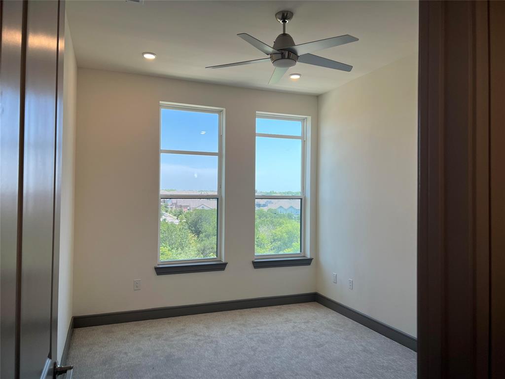 2700 Old Denton Road, Unit 4440 Carrollton, TX 75007 - Photo 4 of 16 a view of an empty room with a window