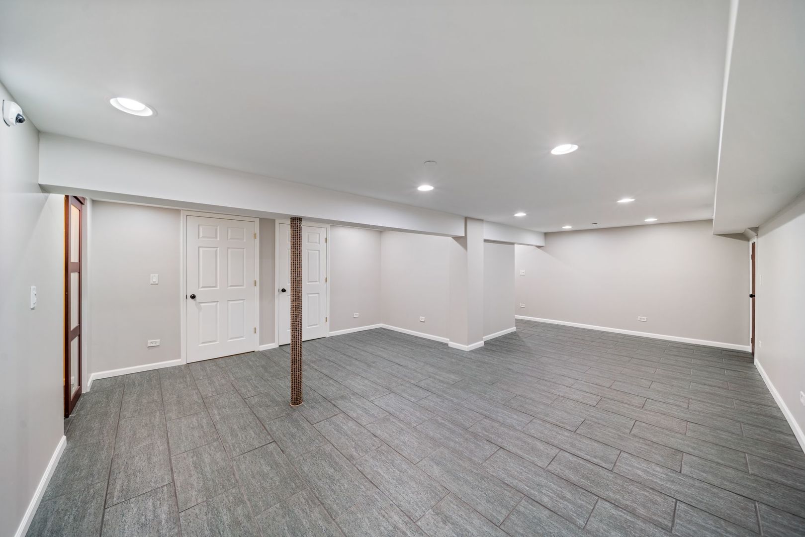 701 Oakton Street Park Ridge, IL 60068 - Photo 43 of 59 a view of an empty room with wooden floor